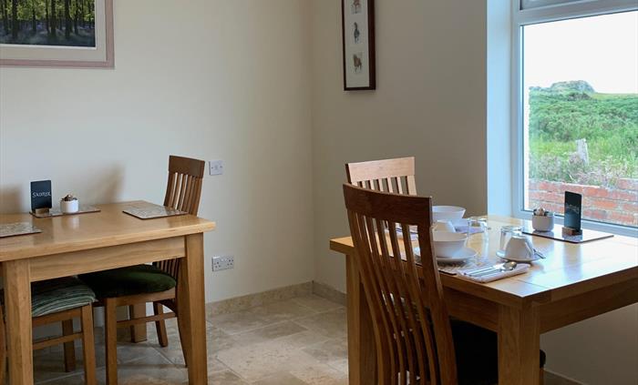 A bright room, where guests can enjoy a continental breakfast.